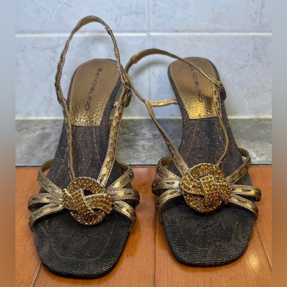 My favorite vintage gold and brown strappy kitten heel with a broach detail.